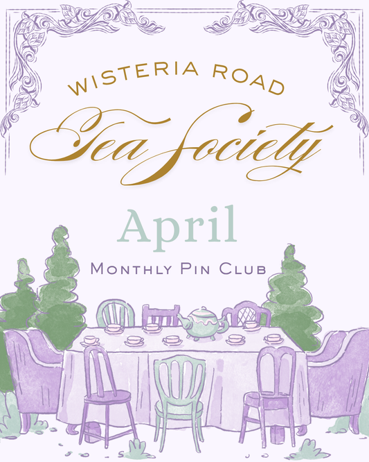 Wisteria Road Tea Society Pin Club April Edition pin featuring a tea-themed design on a light background.
